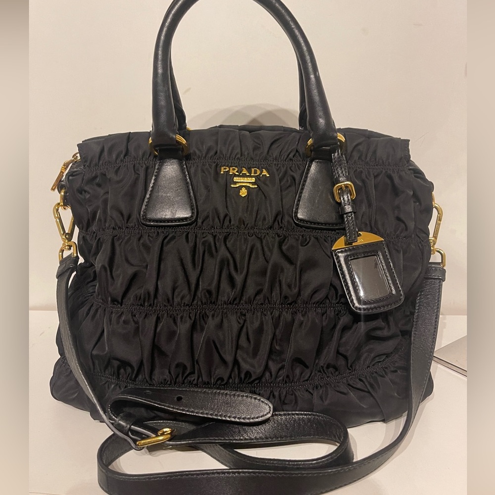 Prada Nappa Trimed Tessuto Handle Bag. Blk-Nylon, gold tone hardware great cond